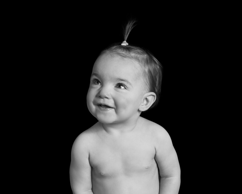 a black and white baby portrait 