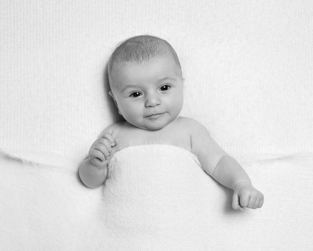 Smiling baby at home newborn session London